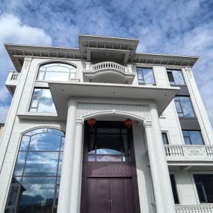 苏州白麻别墅外墙干挂石材效果示例