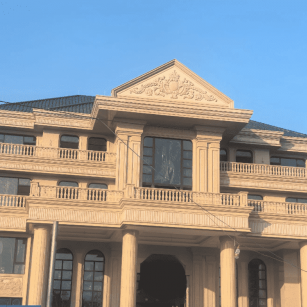 苏州黄金麻别墅外墙干挂石材效果示例